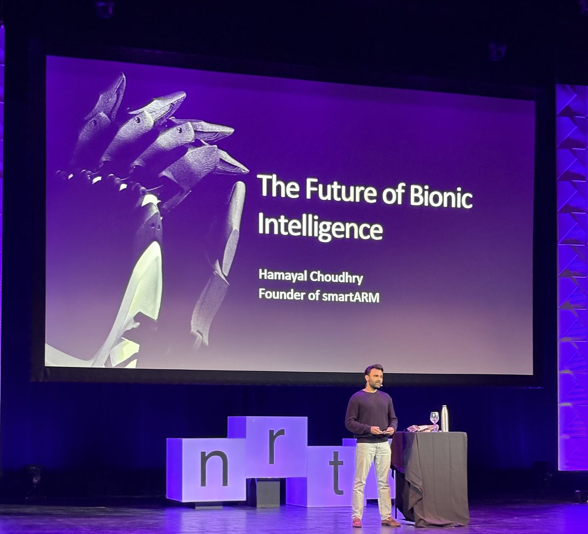 Hamayal Choudhry, founder of smartARM, presenting 'The Future of Bionic Intelligence' on the Moonshots stage at NRTH 2026 in Toronto